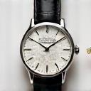 Elegant new limited edition dress watch with a slim profile and guilloche dial